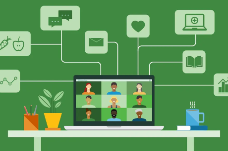 A computer shows faces of people of different backgrounds smiling. The background is green.